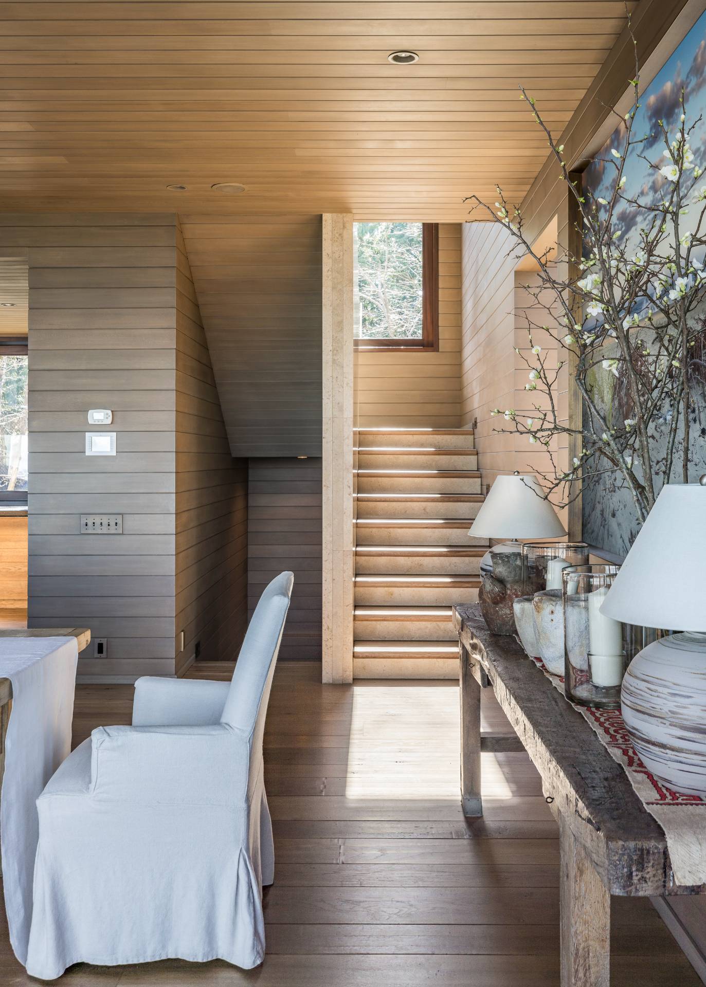 54 Hedges Banks Drive East Hampton, NY 11937 - Photo 12 of 24 a balcony with chairs and wooden floor