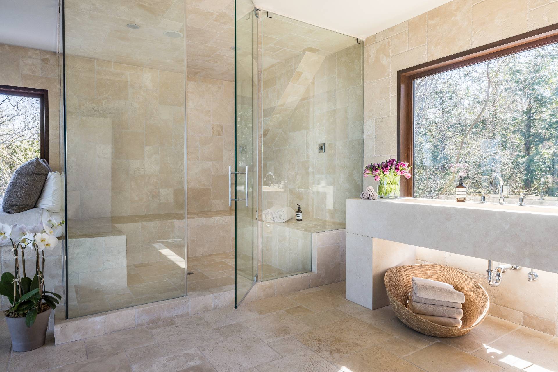 54 Hedges Banks Drive East Hampton, NY 11937 - Photo 16 of 24 a bathroom with a tub and shower