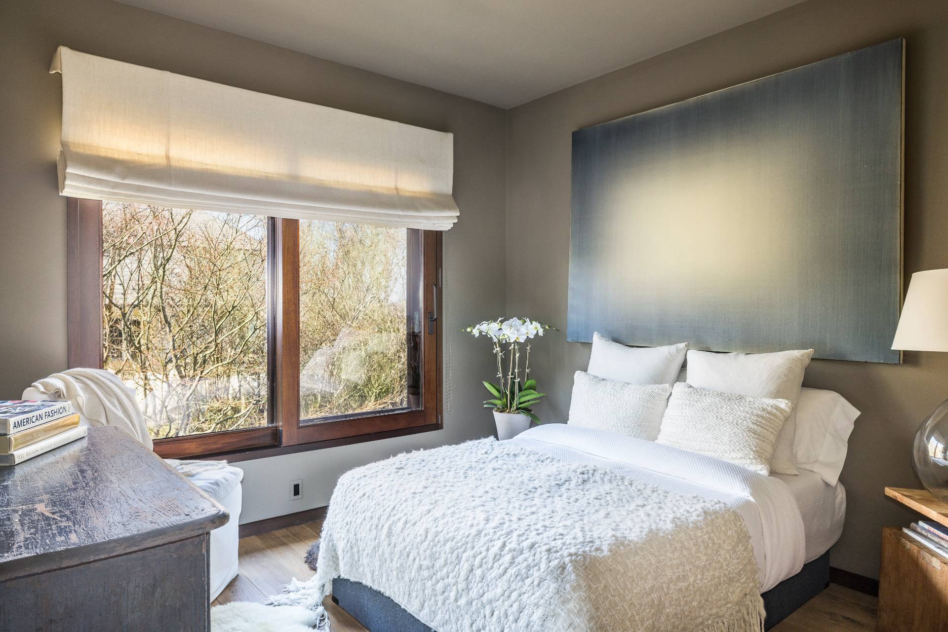 54 Hedges Banks Drive East Hampton, NY 11937 - Photo 17 of 24 a bedroom with a large bed and a window