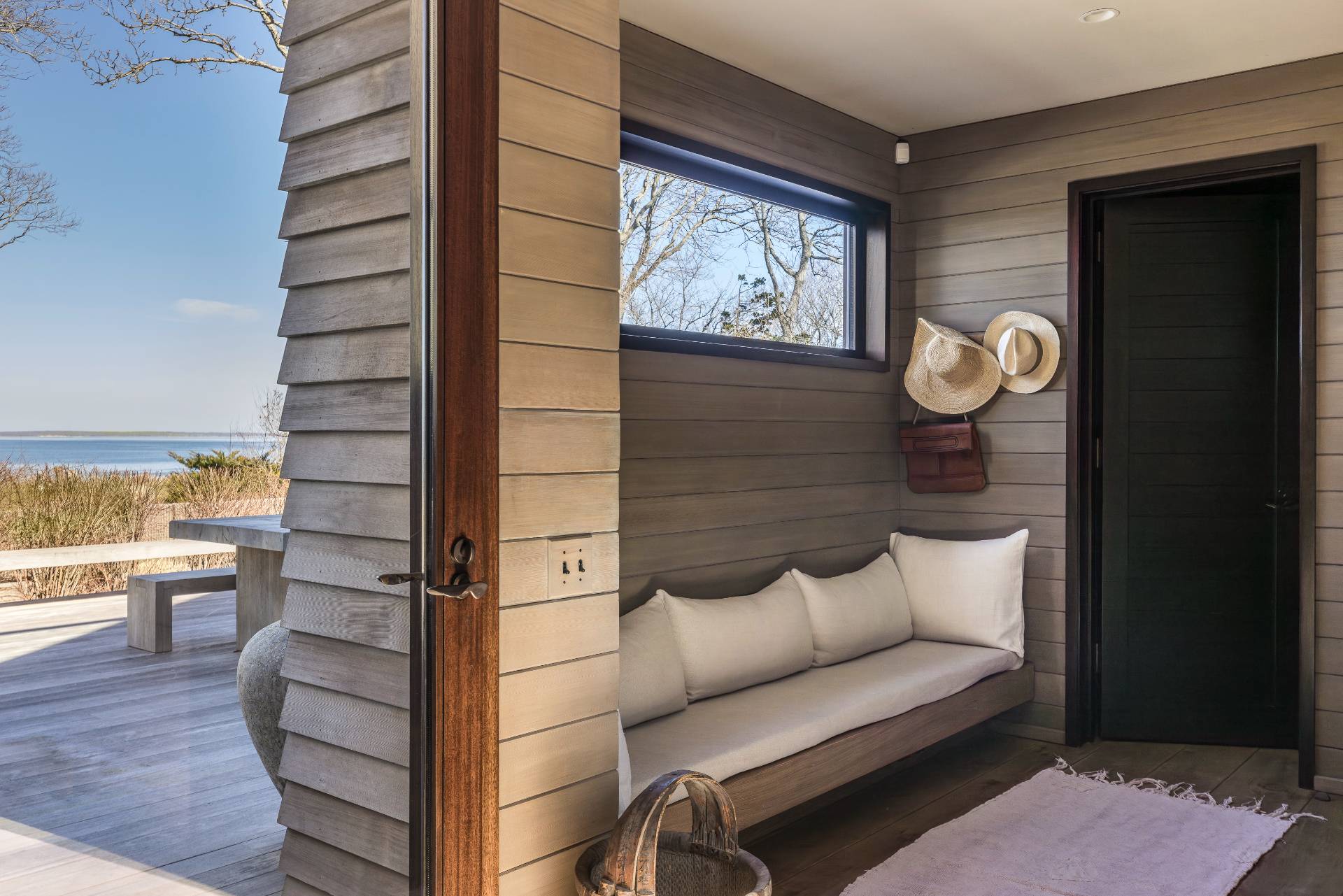 54 Hedges Banks Drive East Hampton, NY 11937 - Photo 18 of 24 a view of entryway with wooden floor and stairs