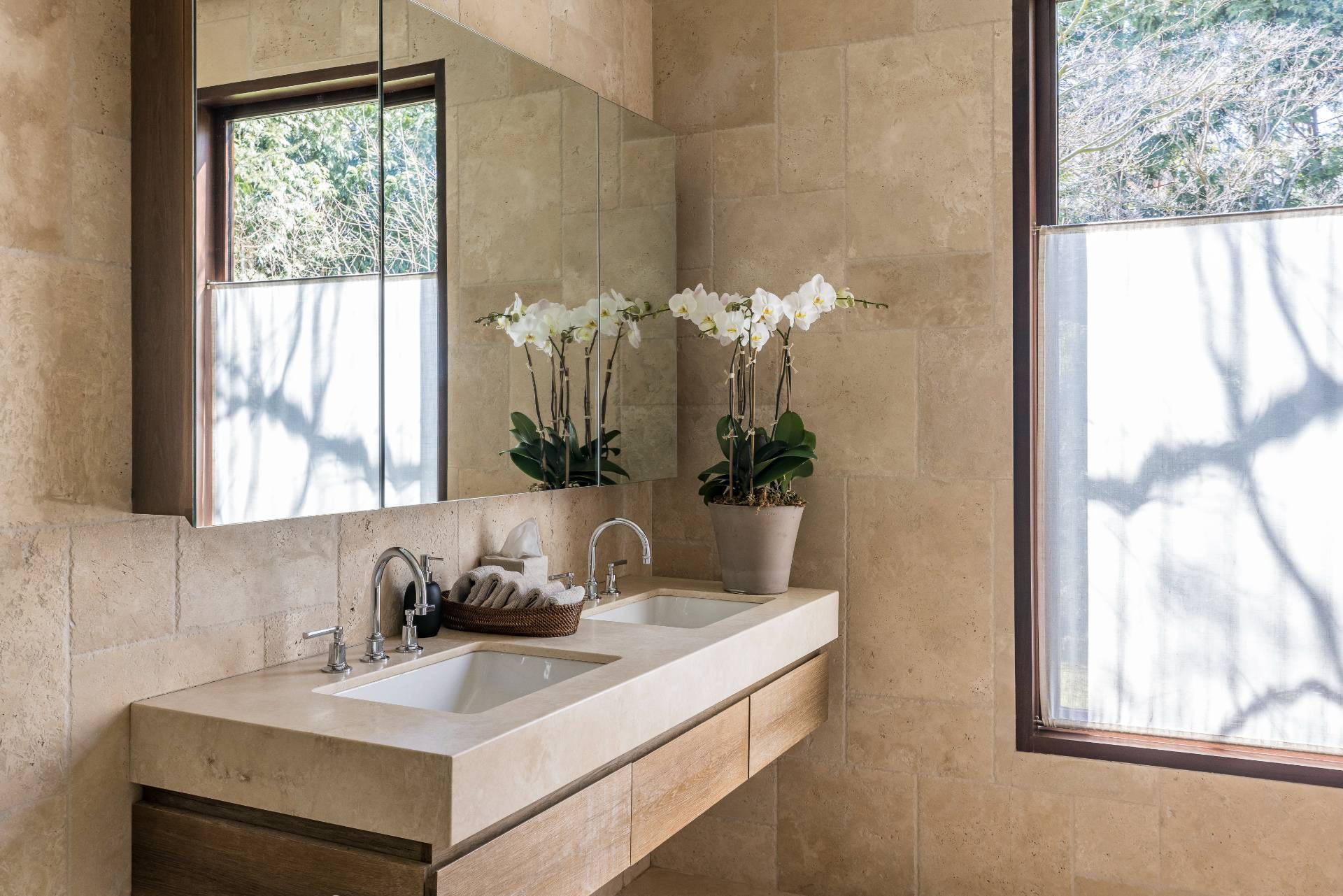54 Hedges Banks Drive East Hampton, NY 11937 - Photo 19 of 24 a bathroom with a sink and a mirror