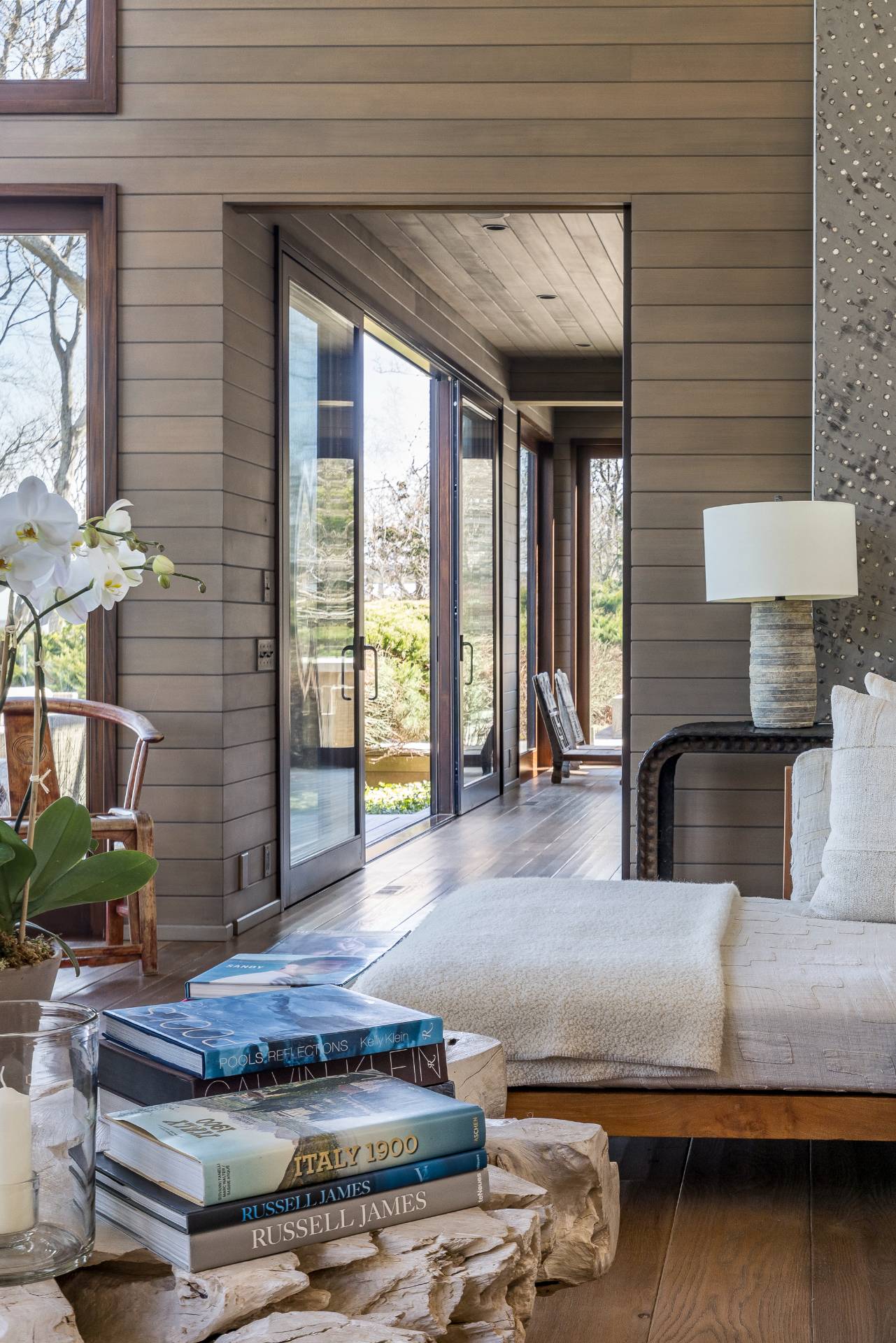 54 Hedges Banks Drive East Hampton, NY 11937 - Photo 9 of 24 a living room with furniture and large windows