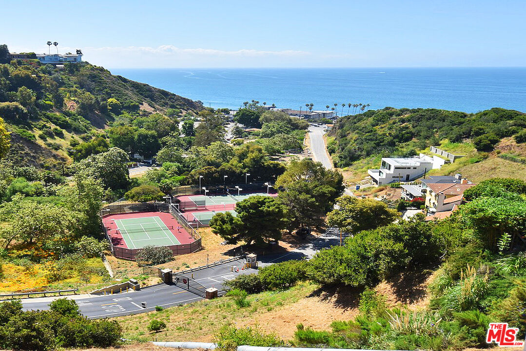 3833 Rambla Pacifico Street Malibu, CA 90265 - Photo 4 of 11 an aerial view of residential houses with outdoor space