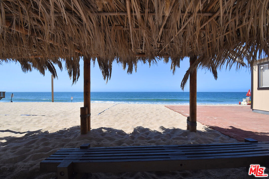 3833 Rambla Pacifico Street Malibu, CA 90265 - Photo 8 of 11 a view of a backyard and ocean