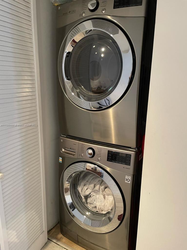 185 Southwest 7th Street, Unit 2703 Miami, FL 33130 - Photo 16 of 16 a close up view of washer and dryer