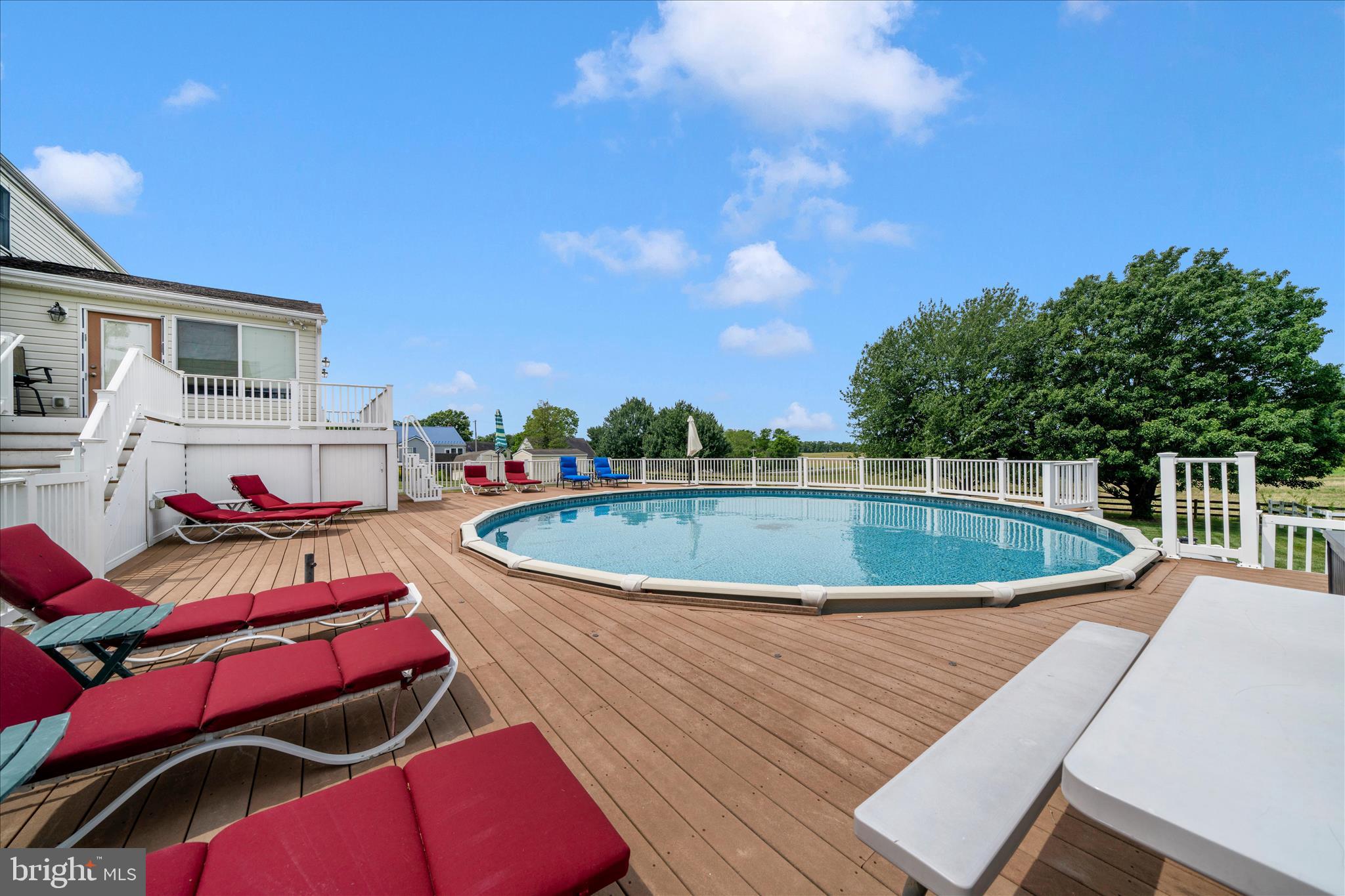 9534 Liberty Road Frederick, MD 21701 - Photo 50 of 70 a view of a swimming pool with a chairs