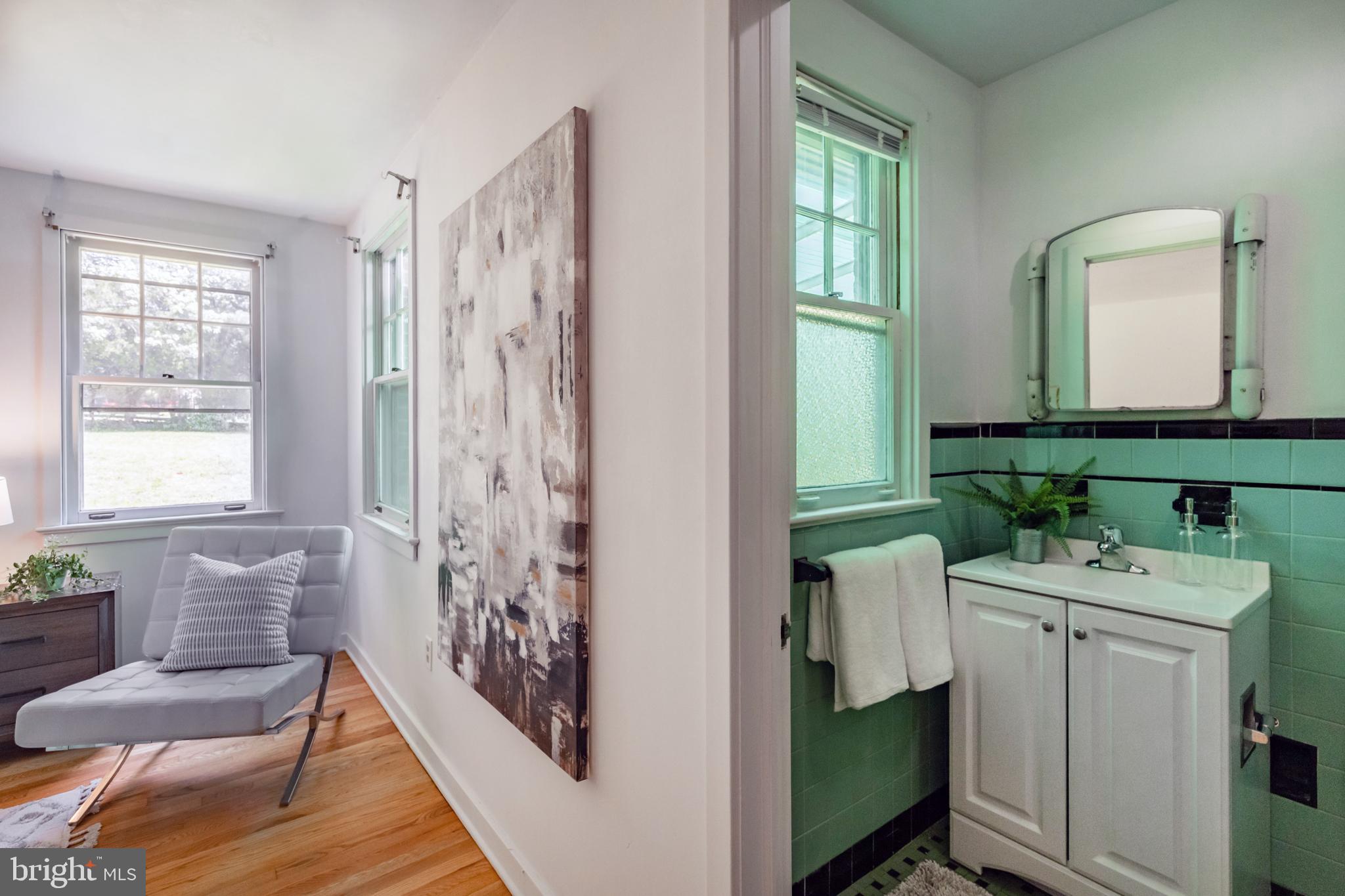262 Ellis Road Havertown, PA 19083 - Photo 24 of 41 a bathroom with a sink a toilet and a mirror