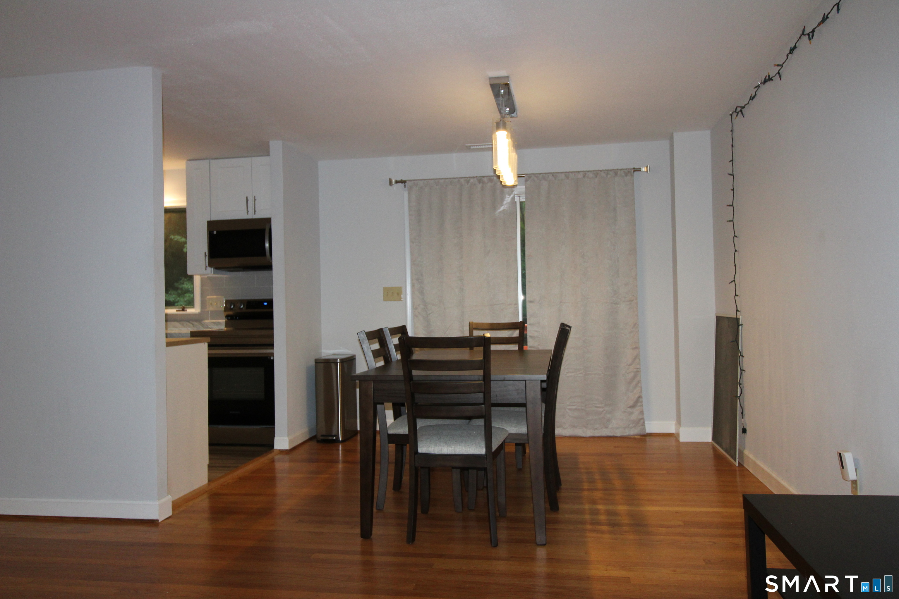 194 Cedar Swamp Road Mansfield, CT 06268 - Photo 6 of 28 Dining room with slider to the deck