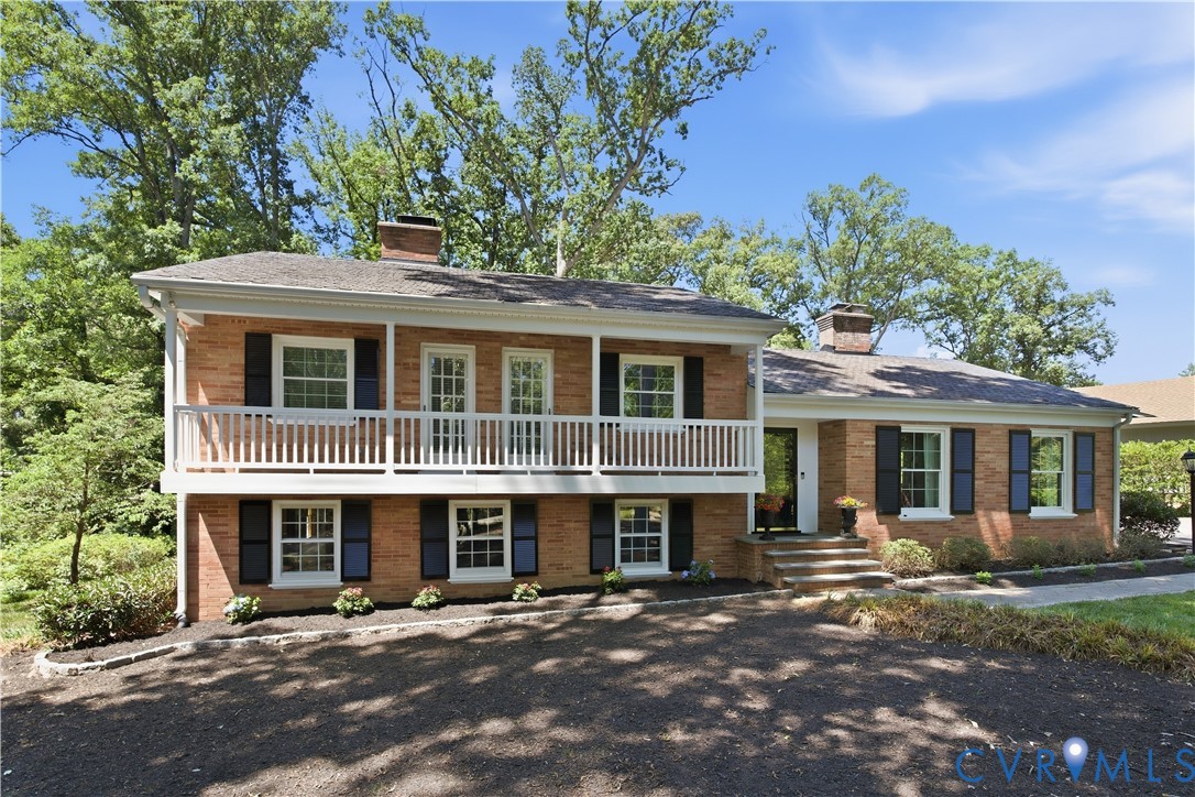 6405 Buckhill Road Richmond, VA 23225 - Photo 2 of 71 Brick exterior featuring an upper-level balcony wi