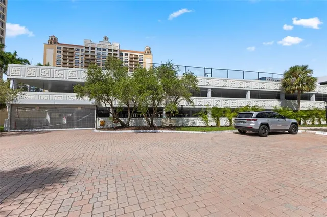 a view of a backyard with sitting area
