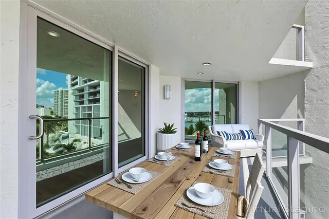 a view of balcony with furniture