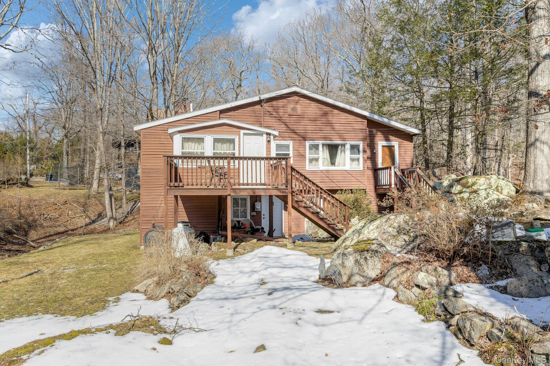 10 Beech Road South Salem, NY 10590 - Photo 2 of 7 a view of a house with a yard covered in snow