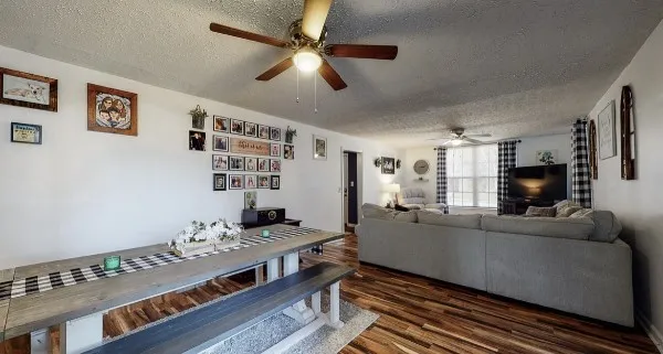 a kitchen with stainless steel appliances granite countertop a stove and cabinets
