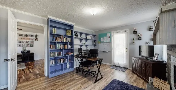 a kitchen with a sink and refrigerator