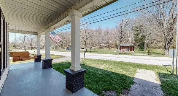 a view of a porch with garden