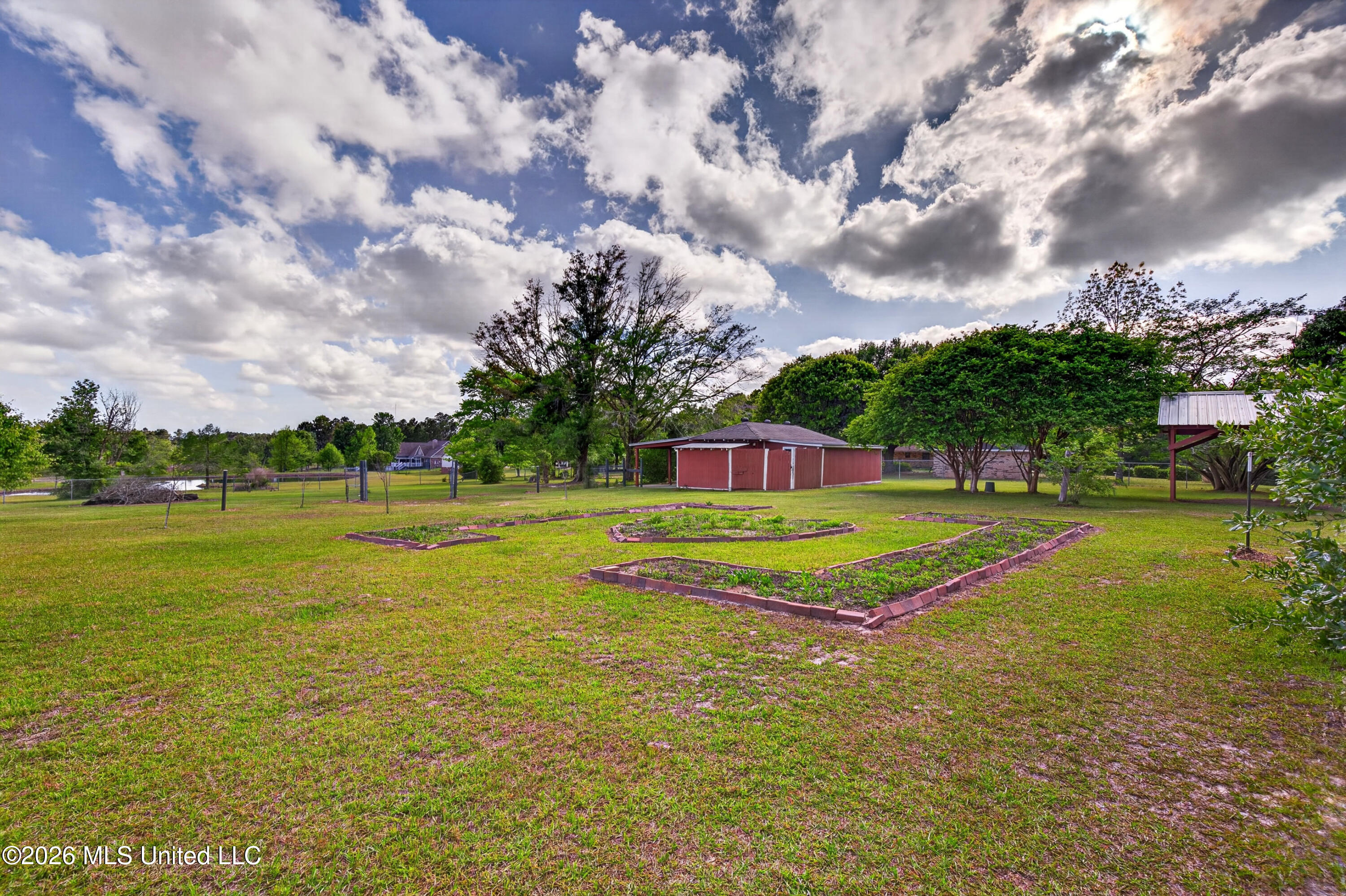 22181 Lorene Road Gulfport, MS 39503 - Photo 46 of 61 Garden area and Barn