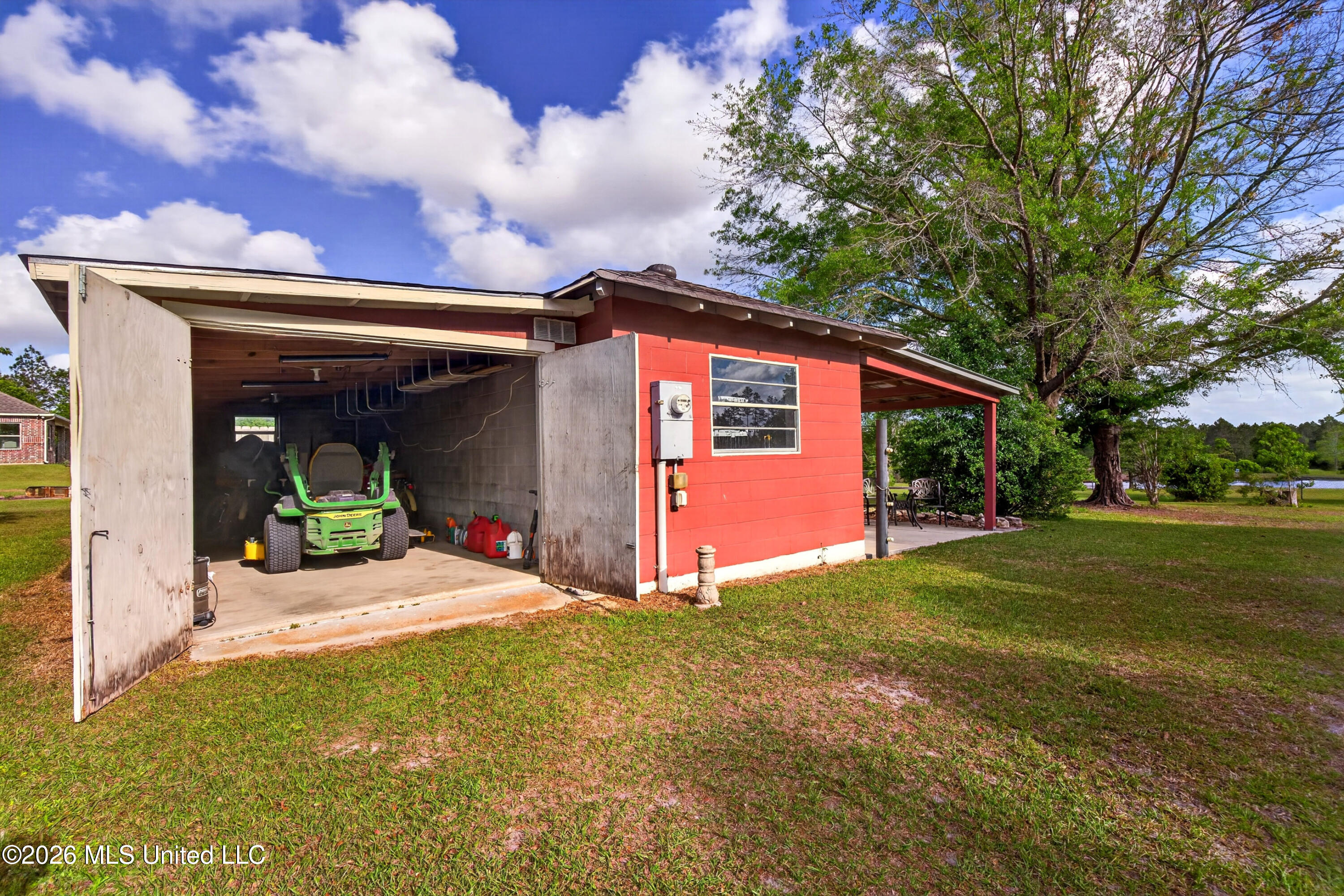 22181 Lorene Road Gulfport, MS 39503 - Photo 49 of 61 Barn storage for yard equipment