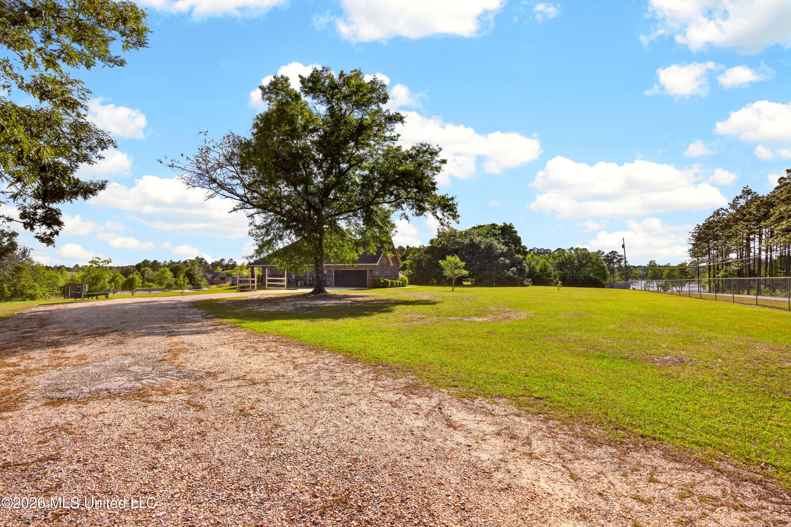22181 Lorene Road Gulfport, MS 39503 - Photo 6 of 61 coming up the gravel drive