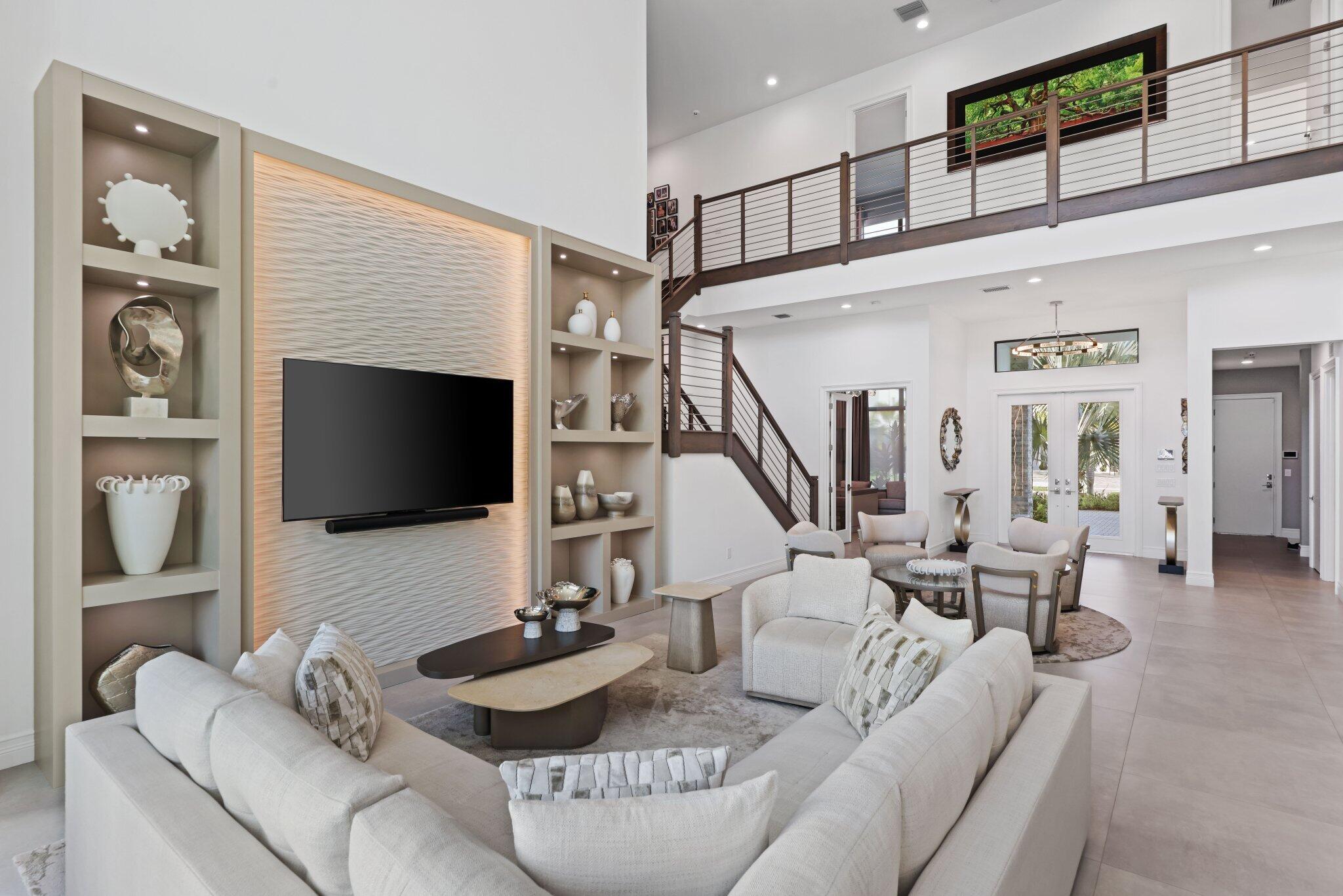 17432 Ponte Chiasso Drive Boca Raton, FL 33496 - Photo 24 of 116 a living room with furniture and a flat screen tv