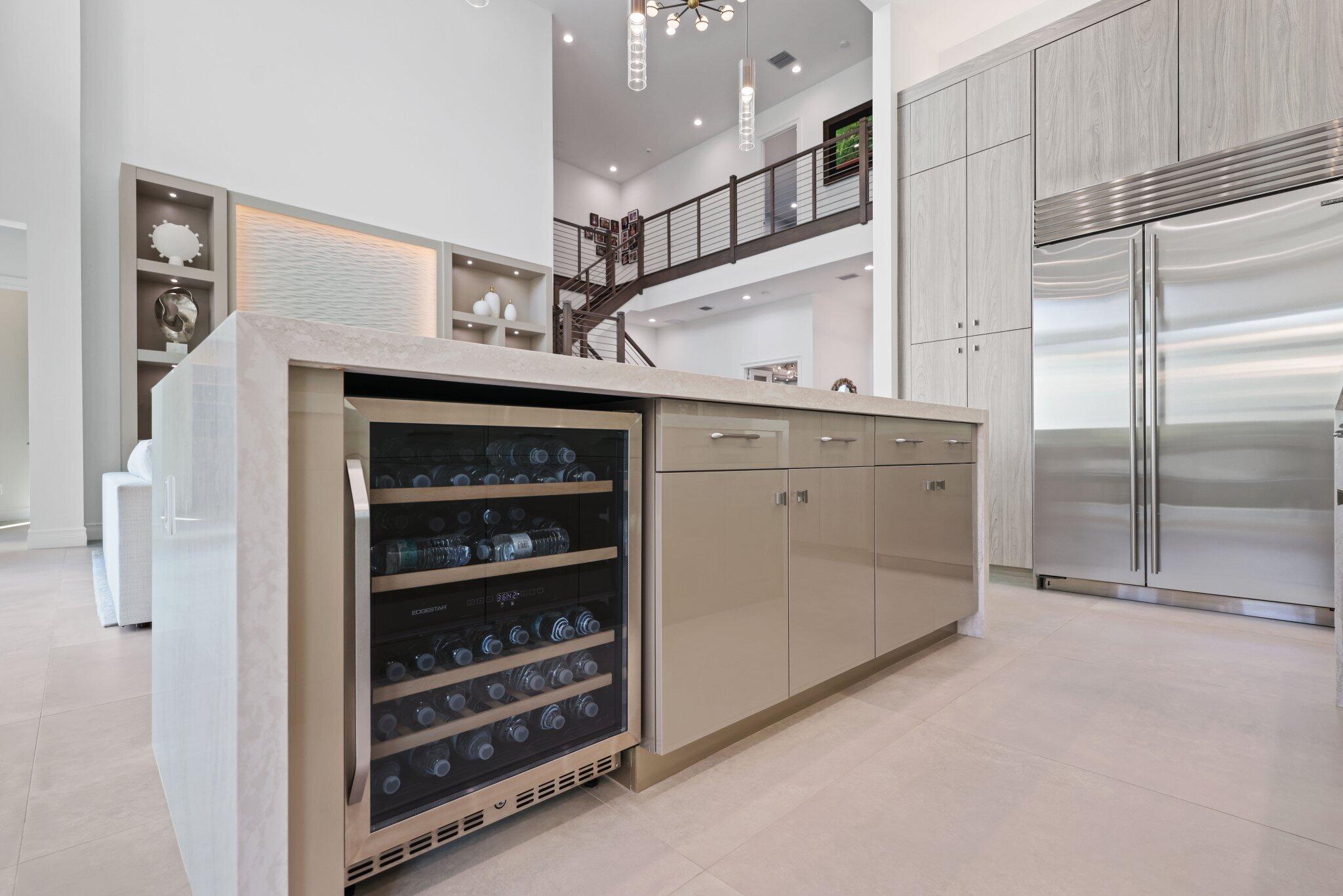 17432 Ponte Chiasso Drive Boca Raton, FL 33496 - Photo 29 of 117 a kitchen with stainless steel appliances a refrigerator and cabinets