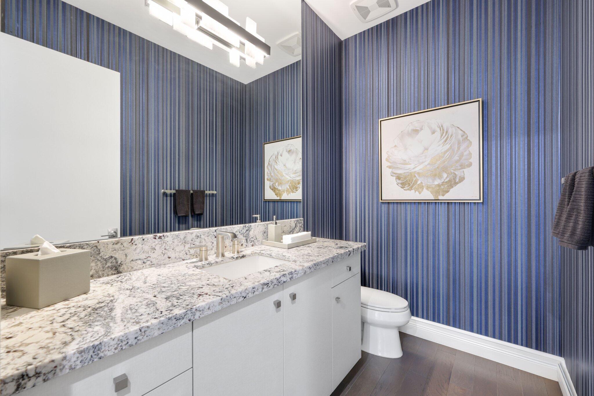 17432 Ponte Chiasso Drive Boca Raton, FL 33496 - Photo 69 of 117 a bathroom with a granite countertop sink toilet and painting on the wall