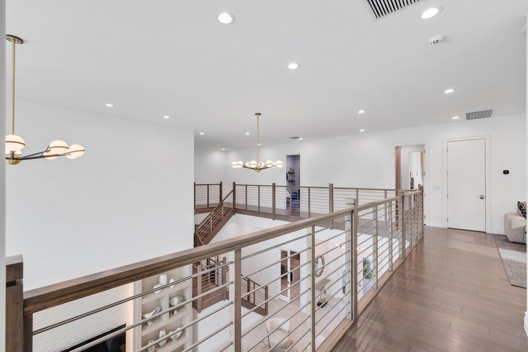 17432 Ponte Chiasso Drive Boca Raton, FL 33496 - Photo 70 of 117 a view of a hallway with seating space