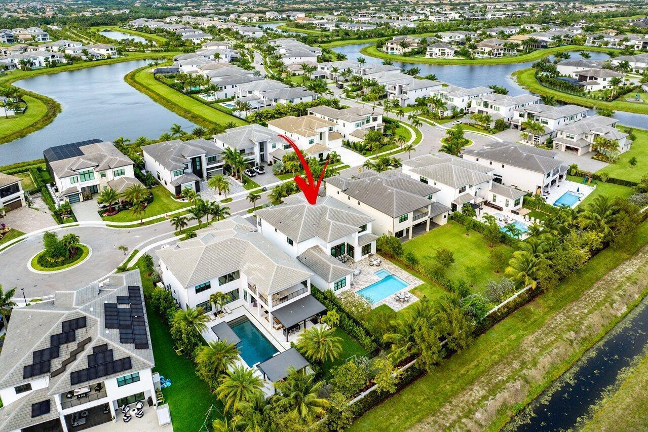 17432 Ponte Chiasso Drive Boca Raton, FL 33496 - Photo 95 of 116 an aerial view of residential houses with outdoor space