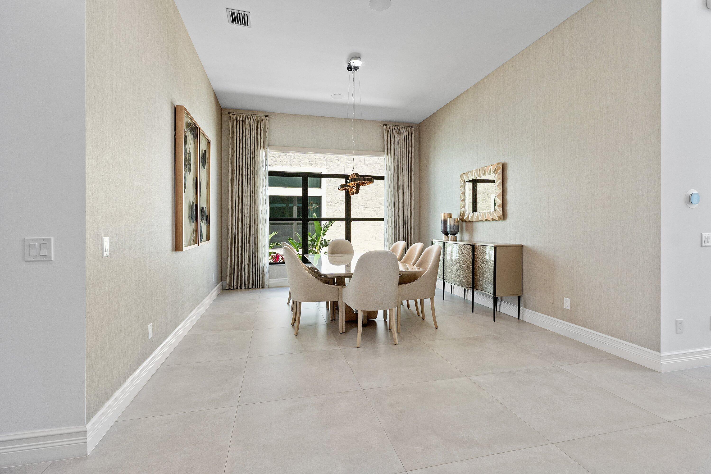 17432 Ponte Chiasso Drive Boca Raton, FL 33496 - Photo 10 of 116 a view of a livingroom with furniture and window