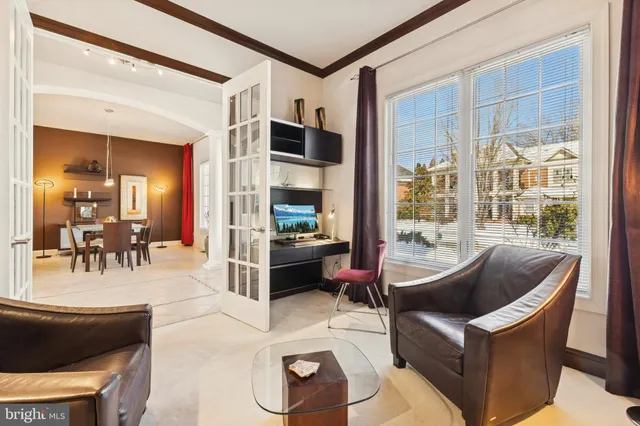 a kitchen with stainless steel appliances kitchen island granite countertop a sink and cabinets