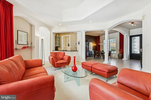 a bedroom with two beds and a lamp