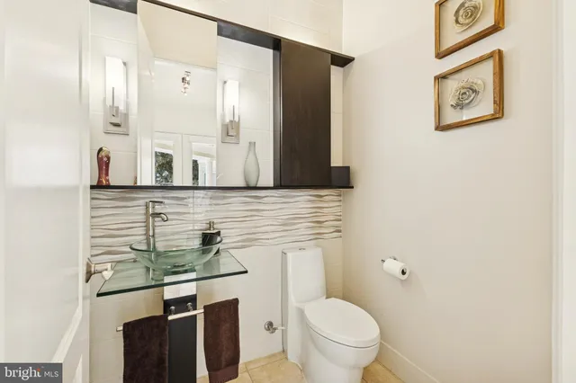 a bedroom with a bed and dresser