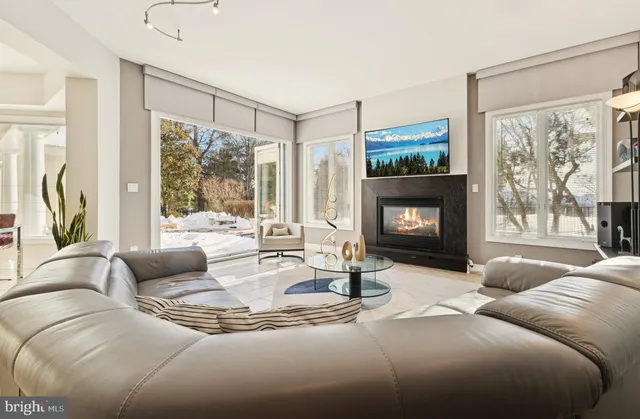 a room with furniture and air hockey table