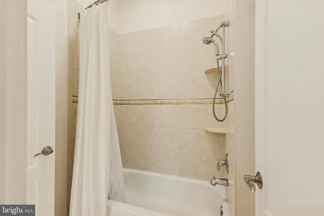 a view of a building with sitting area