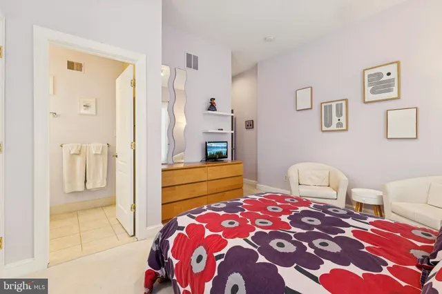 a view of a house with a yard covered in snow