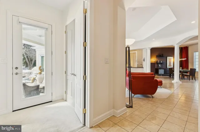 a view of a house with snow on the road