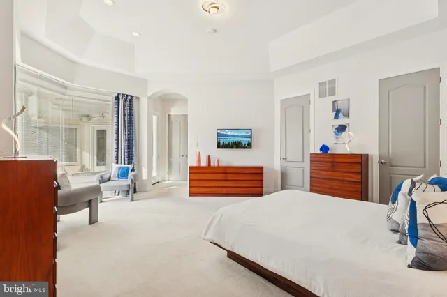 an aerial view of a house swimming pool and outdoor space