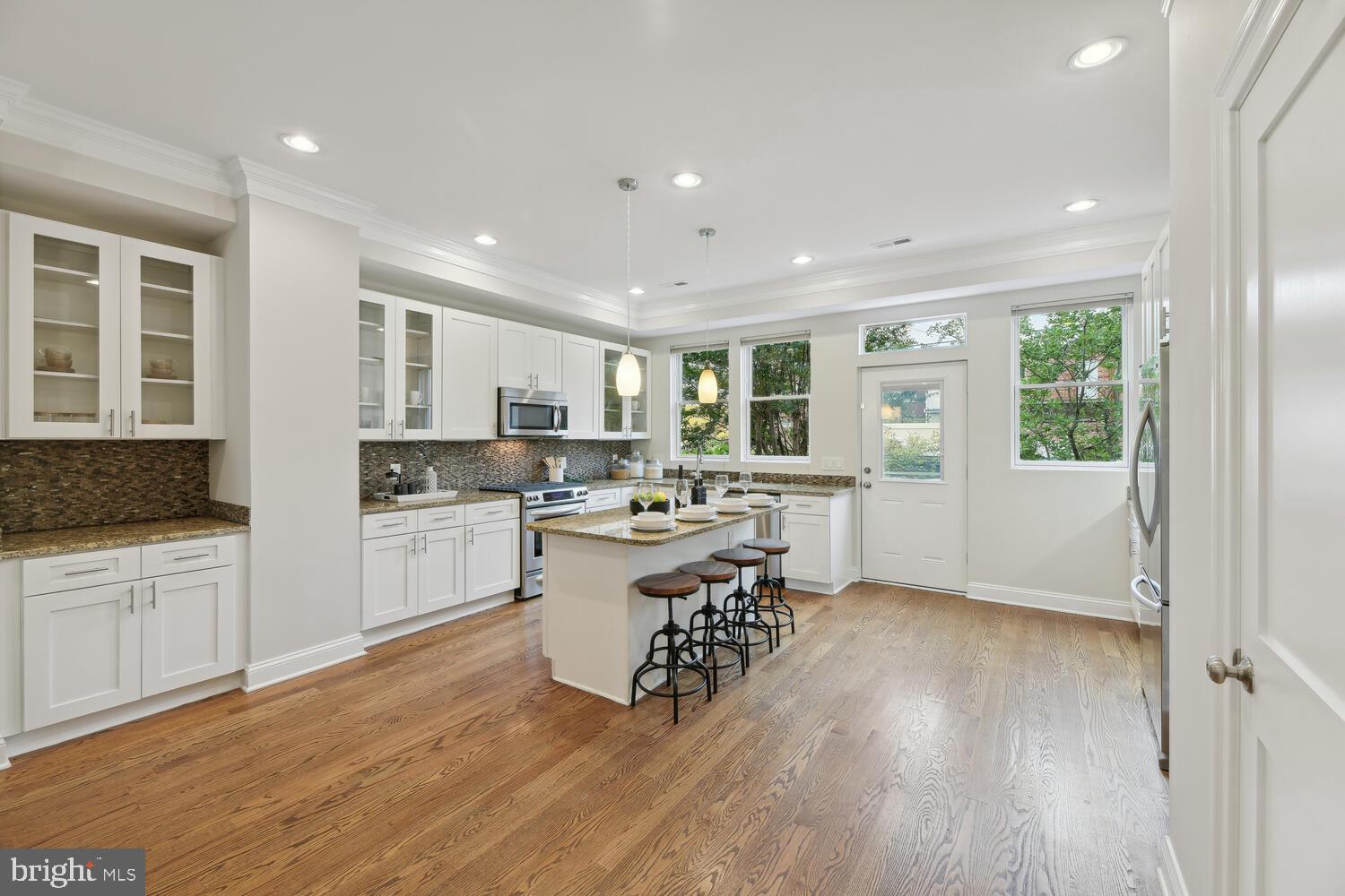 616 6th Street Northeast Washington, DC 20002 - Photo 12 of 29 Bathed in light from three windows and glass door