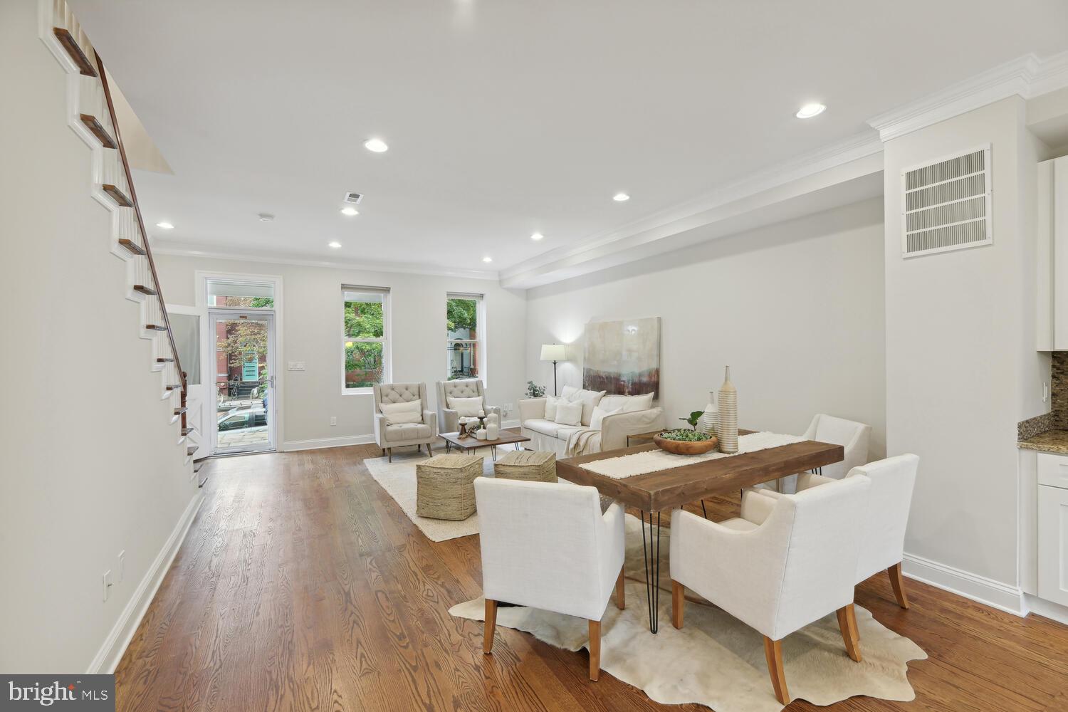 This extra wide row home has excellent flow