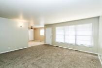 5408 31st Street Lubbock, TX 79407 - Photo 5 of 33 an empty room with a empty space and windows