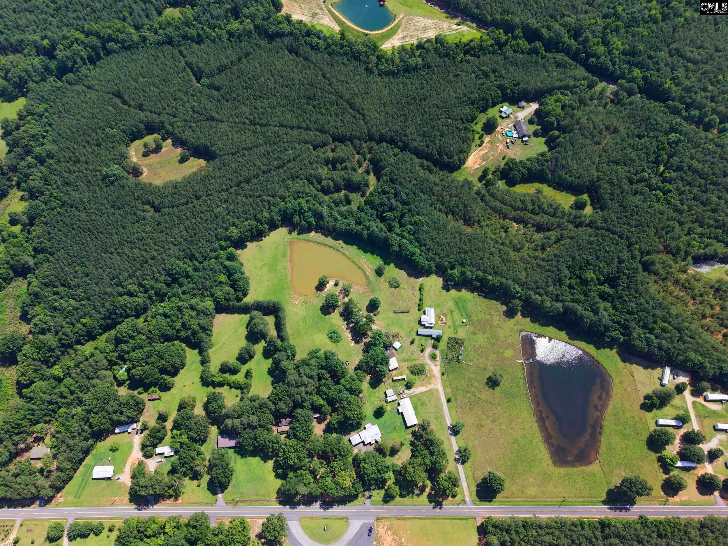 3140 Highway 702 Chappells, SC 29037 - Photo 7 of 39 an aerial view of a house