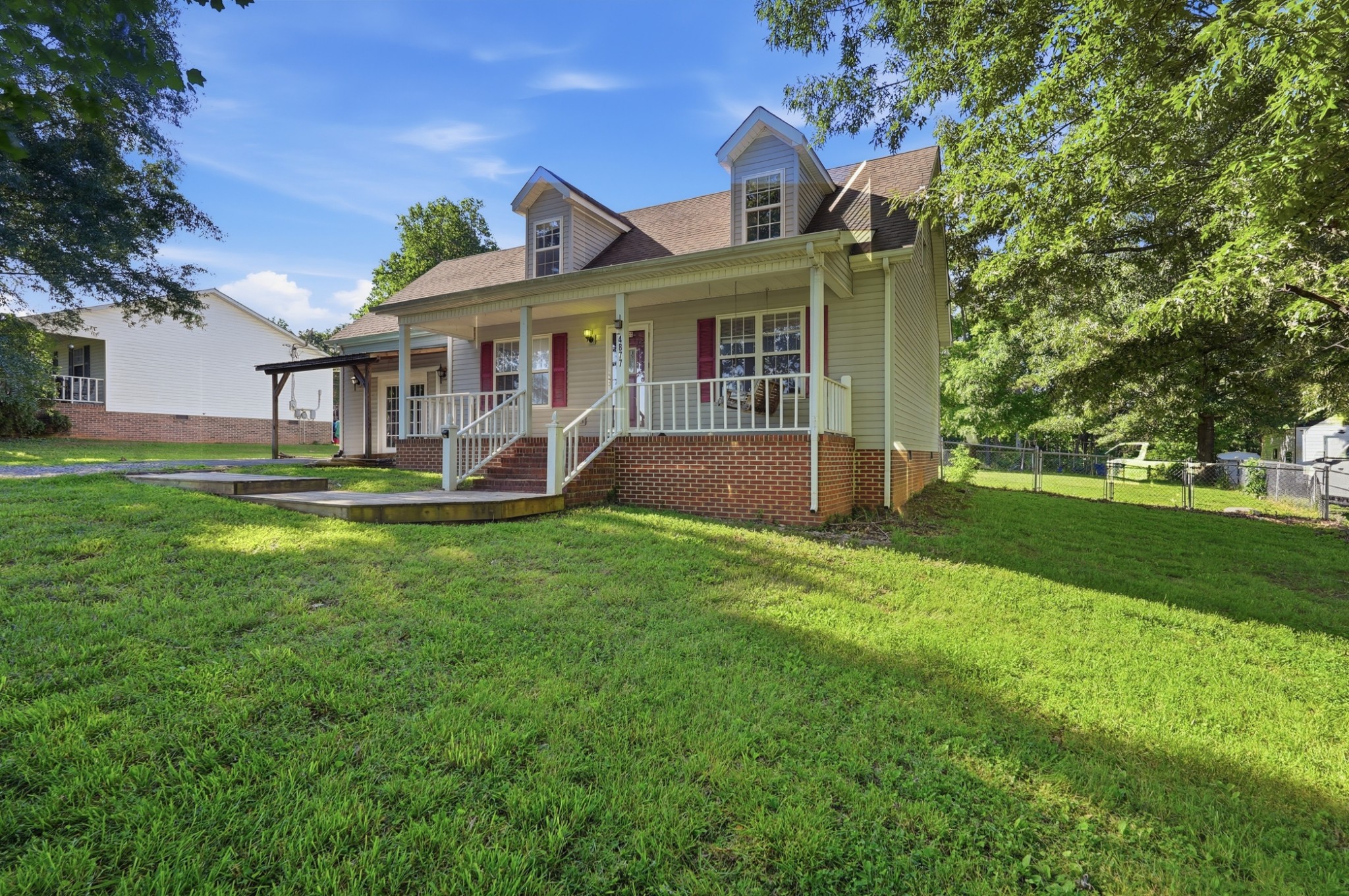 4877 Swafford Road Cookeville, TN 38501 - Photo 2 of 28 a front view of house with yard and green space