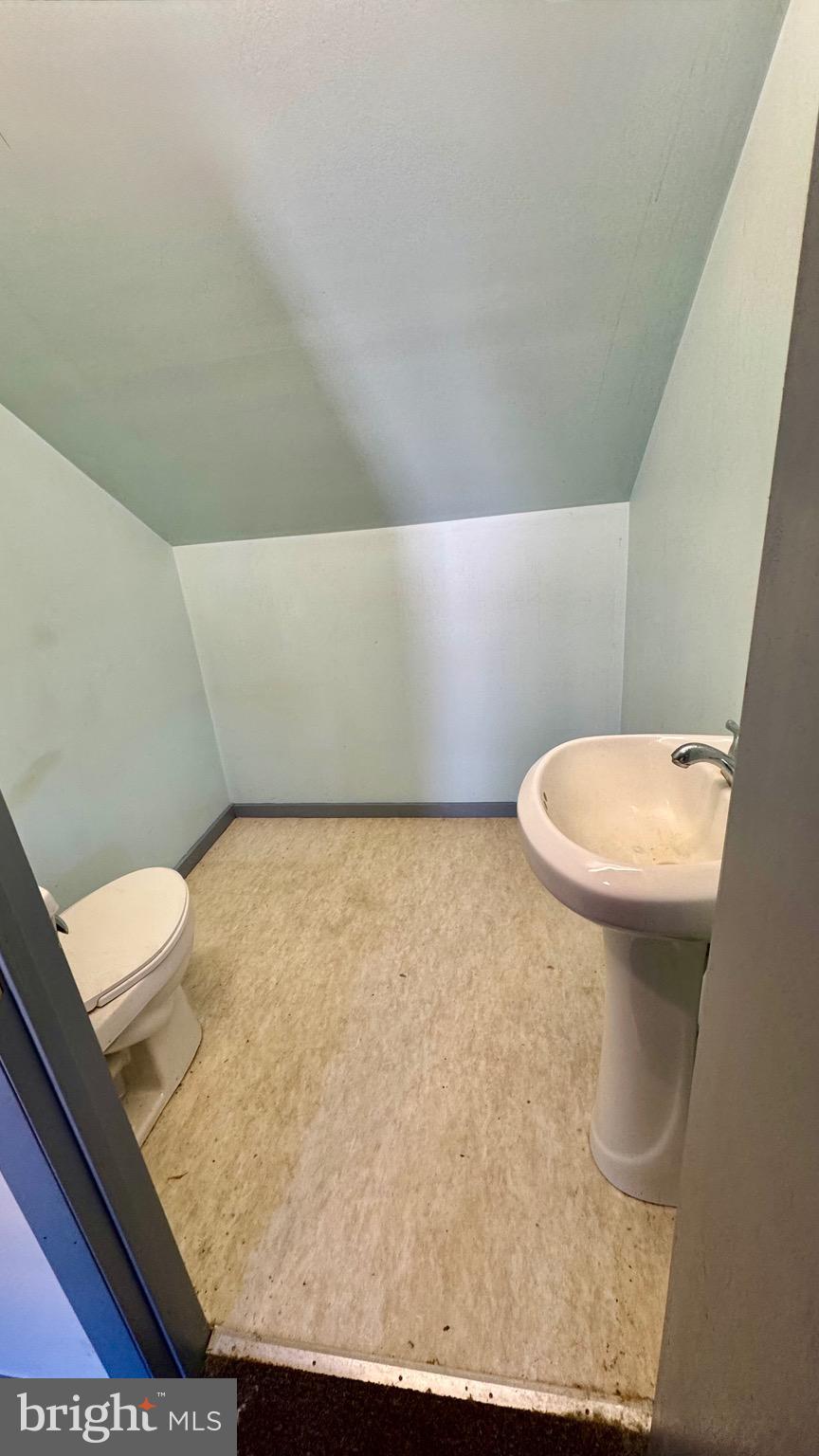 1 Potomac Street Crisfield, MD 21817 - Photo 11 of 15 a bathroom with a toilet
