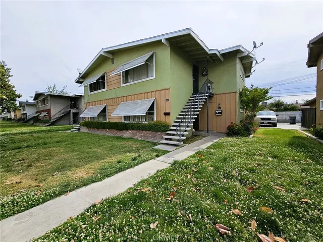 a house view with a garden space