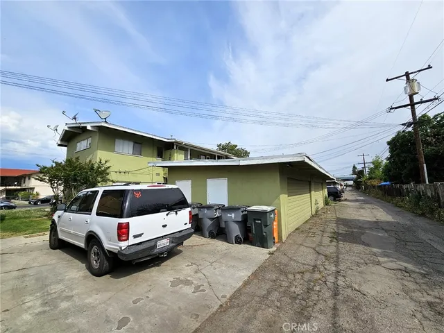 a house view with a garden space