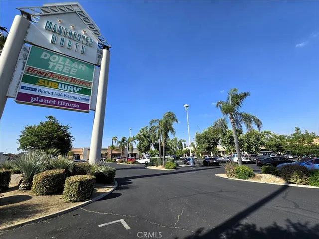 a view of a street with cars