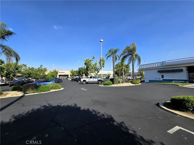 a street view with tall buildings and a street view