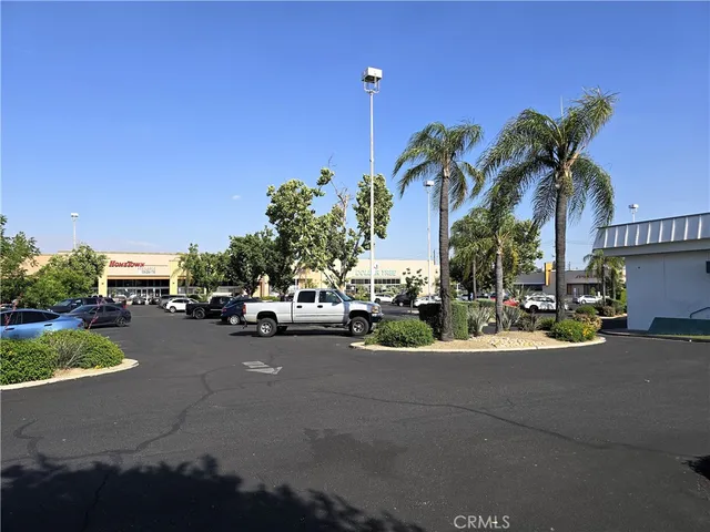 a view of a street with cars