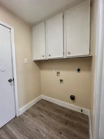 a view of room with hardwood floor