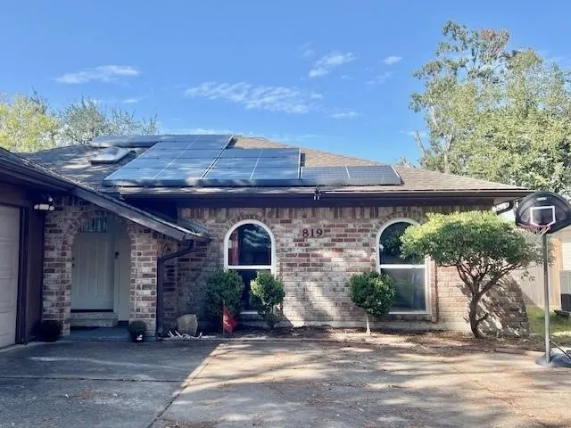 a view of a house with a patio