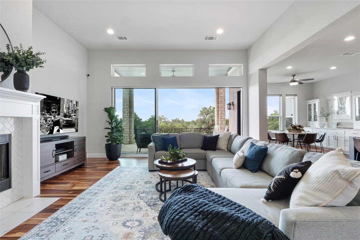 504 Loyal June Trail Leander, TX 78641 - Photo 6 of 16 a living room with furniture potted plant and a large window